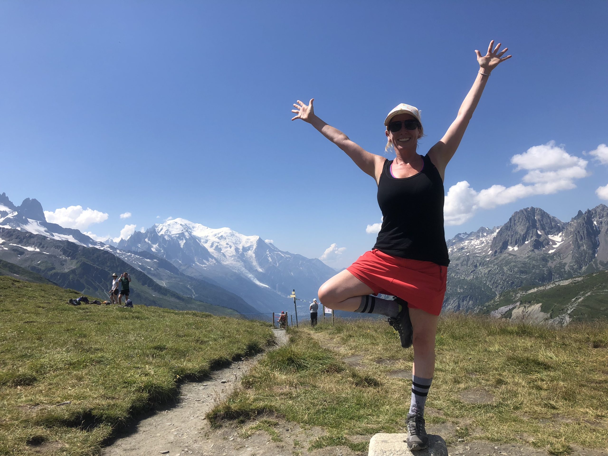 me during the Tour du Mont Blanc guided trek, entering into Switzerland with Mont Blanc in the background