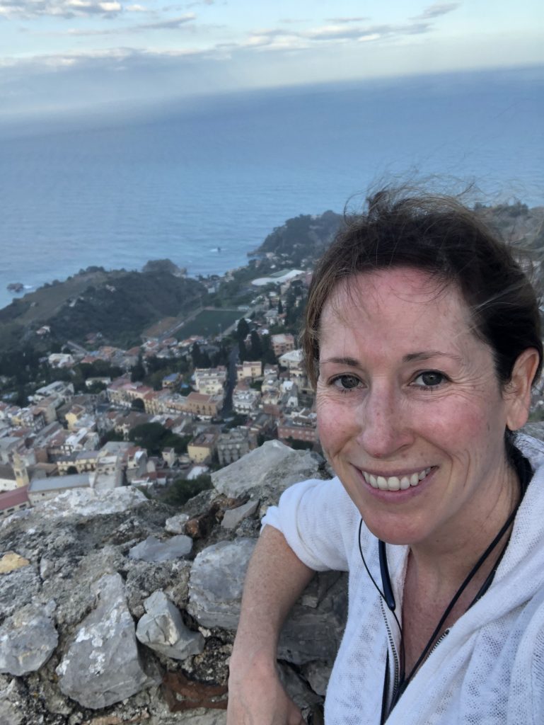 me at the top of the hill overlooking Taormina