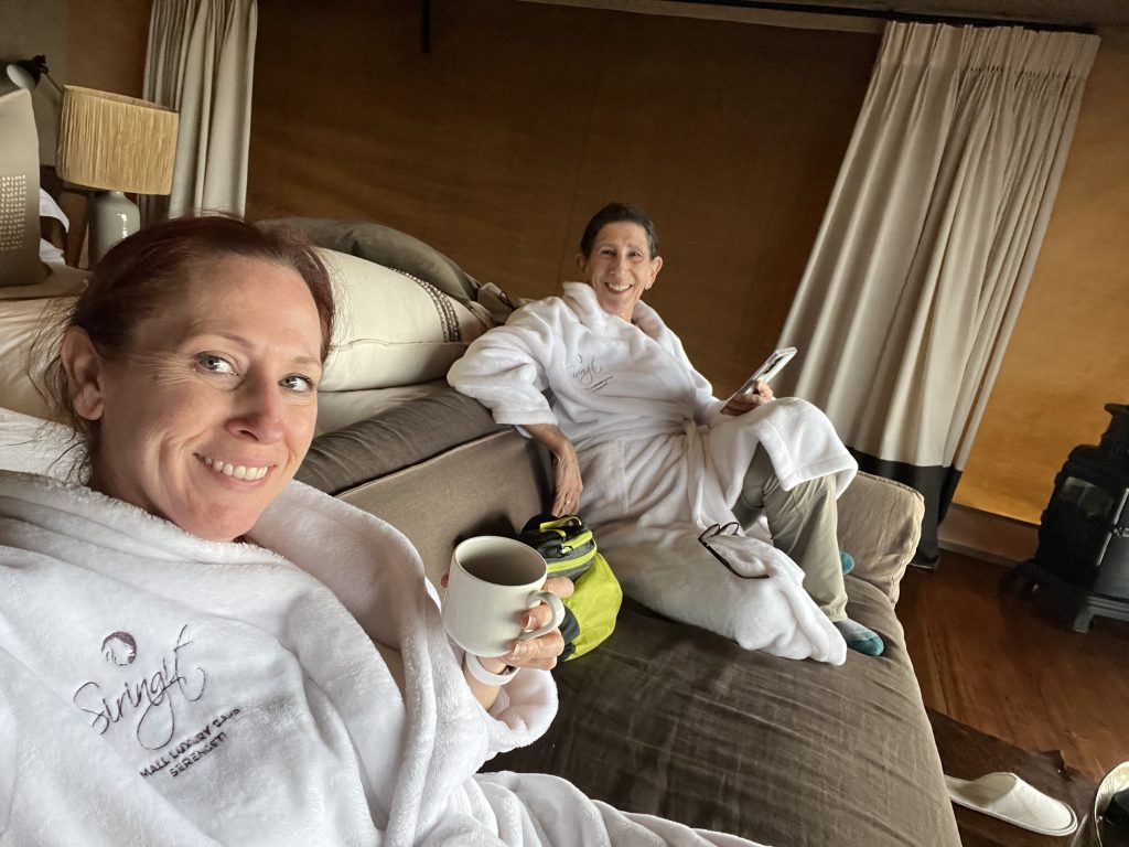 relaxing in our tent in the Serengeti - leisurely mornings are allowed when traveling after 50